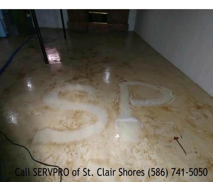 urine soaked basement floor 