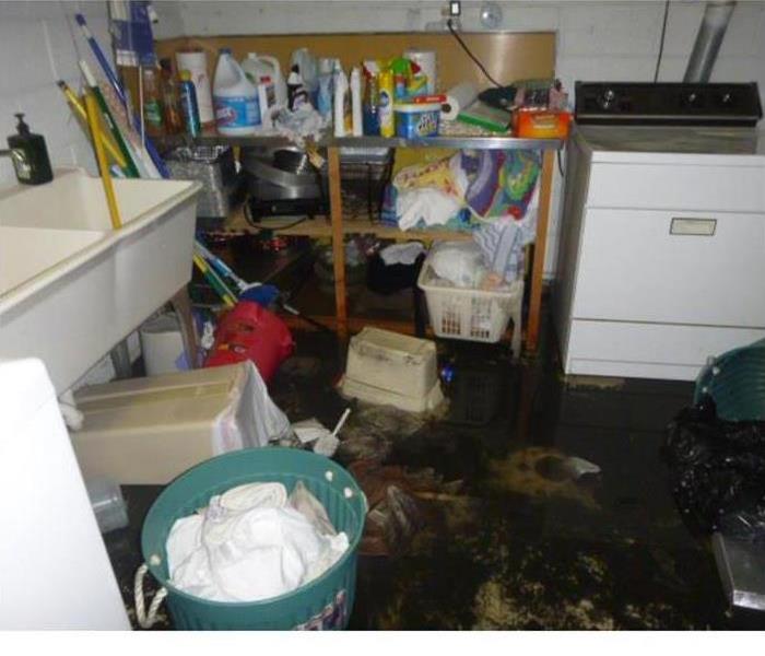 basement with sewage backup from storm damage 