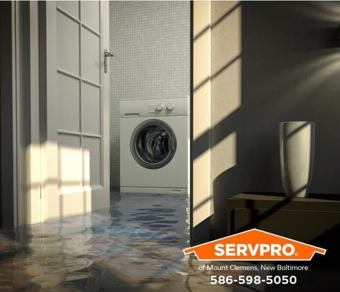 A flooded laundry room floor is shown.
