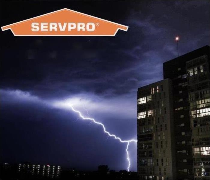 lightning striking and SERVPRO logo in dark sky
